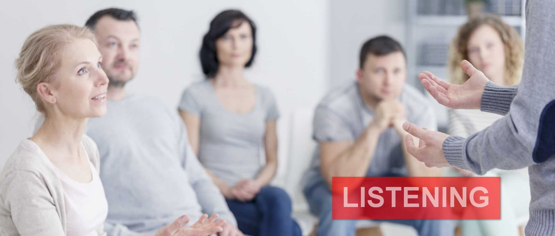 Woman psychologist speaking during group psychotherapy session
